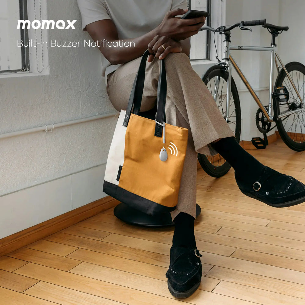 Der Pinpop² Lite als Beispiel an einer Tasche - Bild: Momax