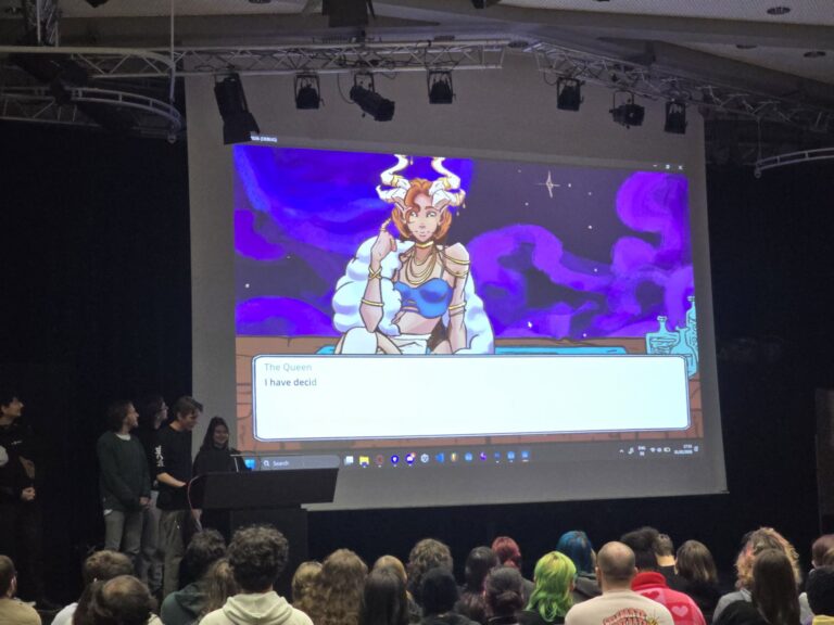 Das Spiel "Just a Tiny Mask Shop Mall Multiverse" bei der Präsentation auf der Global Gam Jam 2026 in Freiburg