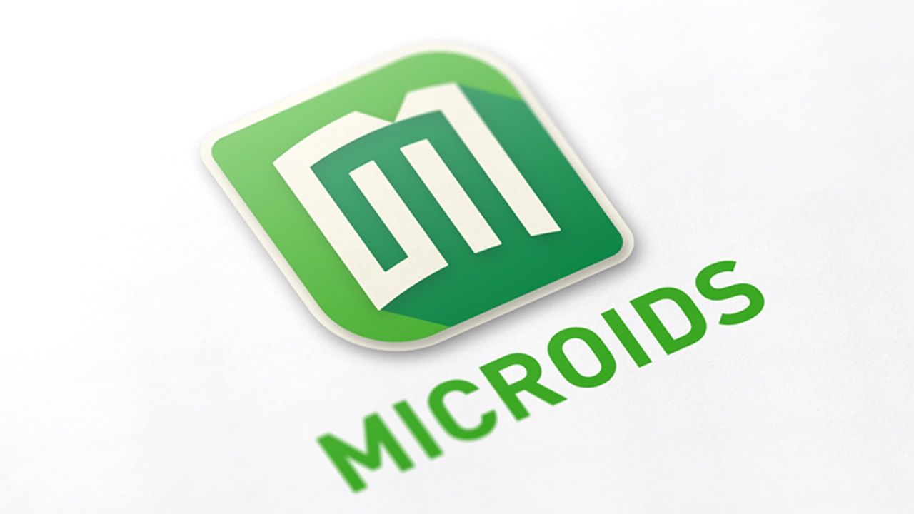 Microids-Logo vor Berliner Skyline mit Fernsehturm