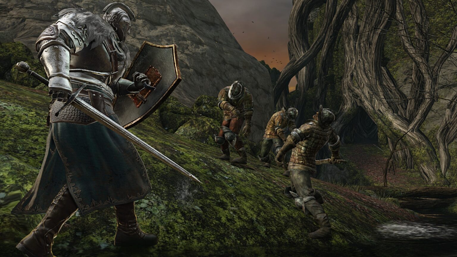 Gepanzerter Kämpfer mit Schwert und Schild vor Untoten in Dark Souls II