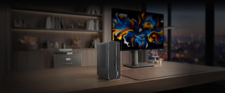 MSI PRO MAX EDGE AI+ auf einem Schreibtisch mit Monitor - Bild: MSI