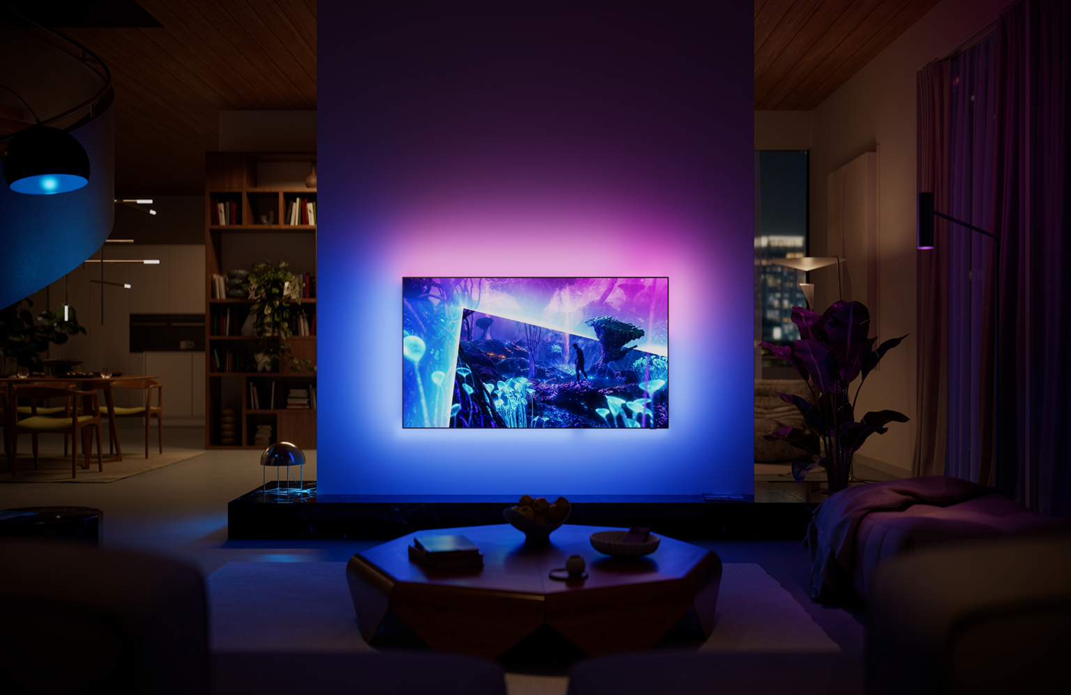 Philips OLED+951 vor einer blau-violett beleuchteten Wohnzimmerwand